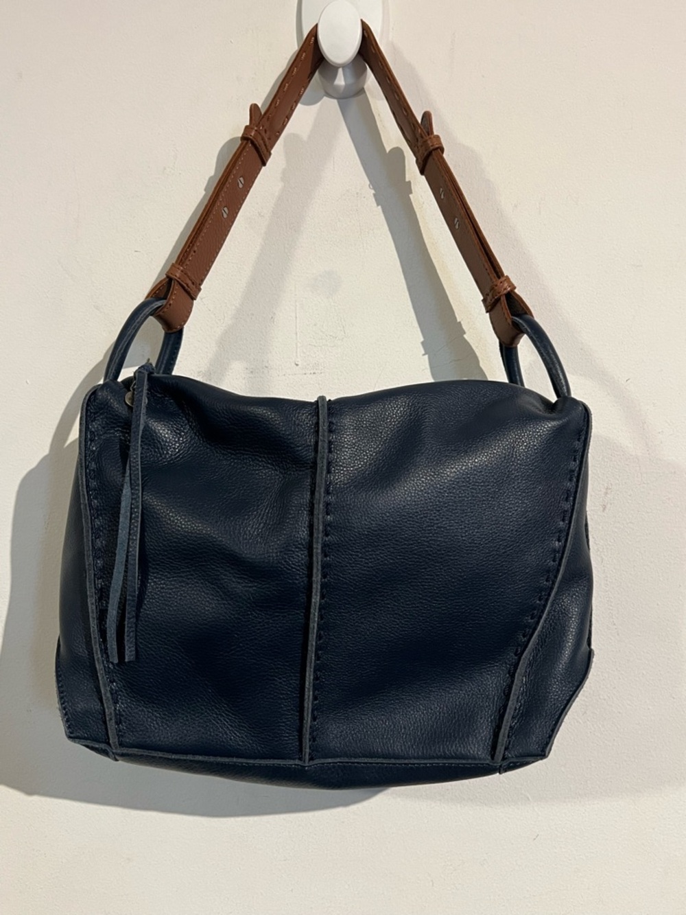 The Sak Classic Navy Leather Shoulder Bag with Brown Strap